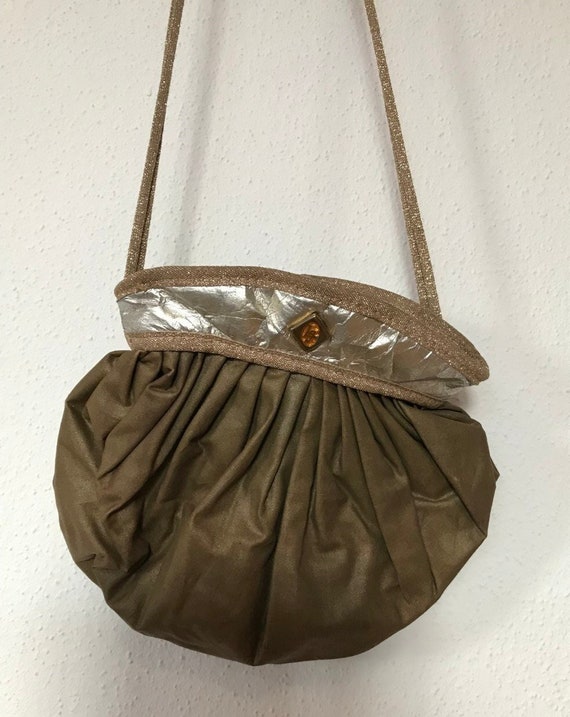 Buy Extravagant Evening Bag Made of Glittering Gold Fabric Online