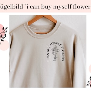 Könnte beinhalten: Ein beiger Pullover mit einem schwarzen Grafikdruck, der in einem kreisförmigen Design "Ich kann mir selbst Blumen kaufen" mit einem Blumenstrauß in der Mitte lautet.