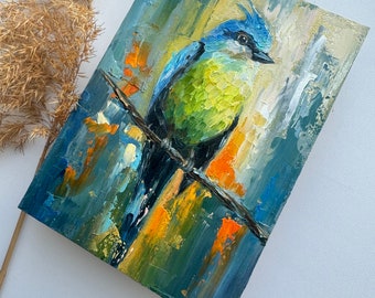 青い顔の人物画 鳥付き