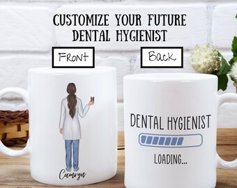 May include: White ceramic mug with a design of a woman in a white coat holding a cup of coffee. The text "Dental Hygienist" is printed on the front of the mug with the name "Cameron" below. The back of the mug has the text "Dental Hygienist" with a progress bar that says "Loading..."