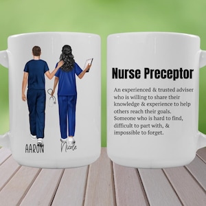 May include: White ceramic mug featuring a blue and white illustration of two nurses walking side-by-side. The mug displays the text "Nurse Preceptor" and a definition of the term. The mug also has the names "Aaron" and "Nicole" written on the bottom.