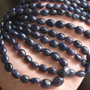 Dyed Ruby Oval Beads Strand: 17 Inch, 5-10mm Gemstone