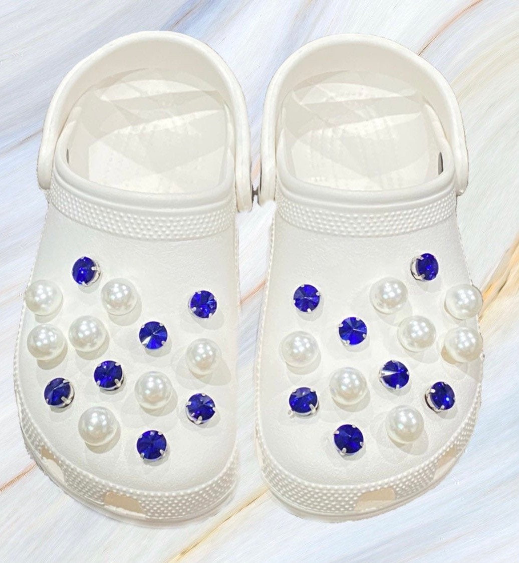 blue crocs with charms