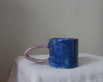 Lilac handle blue mug