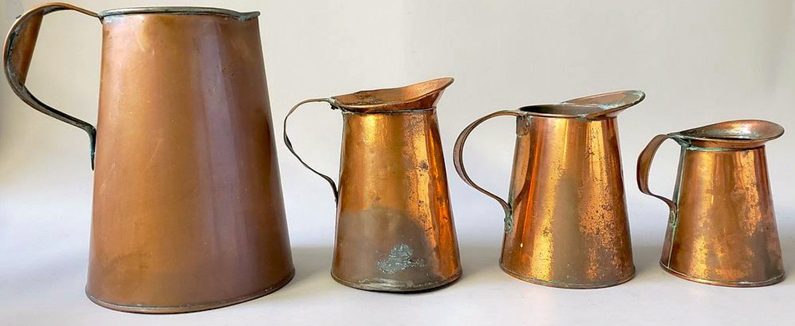 Set of Four Antique Copper Pitchers Etsy