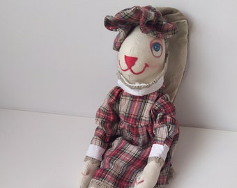 Handmade stuffed bunny, Cloth rabbit in clothes.