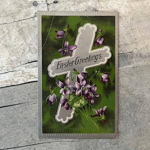 Antique Easter Post Card Embossed Easter Greetings Silver Cross with purple flowers