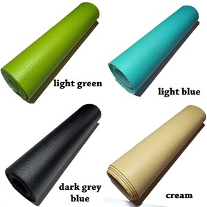May include: Four rolls of faux leather in different colors: light green, light blue, dark grey blue, and cream.