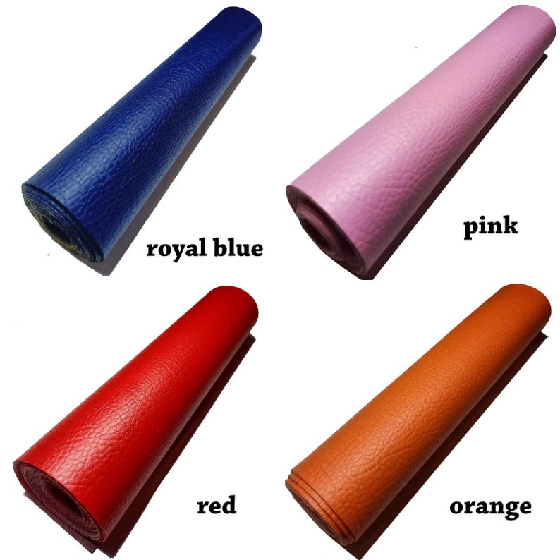 May include: Four rolls of faux leather in different colors: royal blue, pink, red, and orange. The rolls are all the same size and have a textured surface.