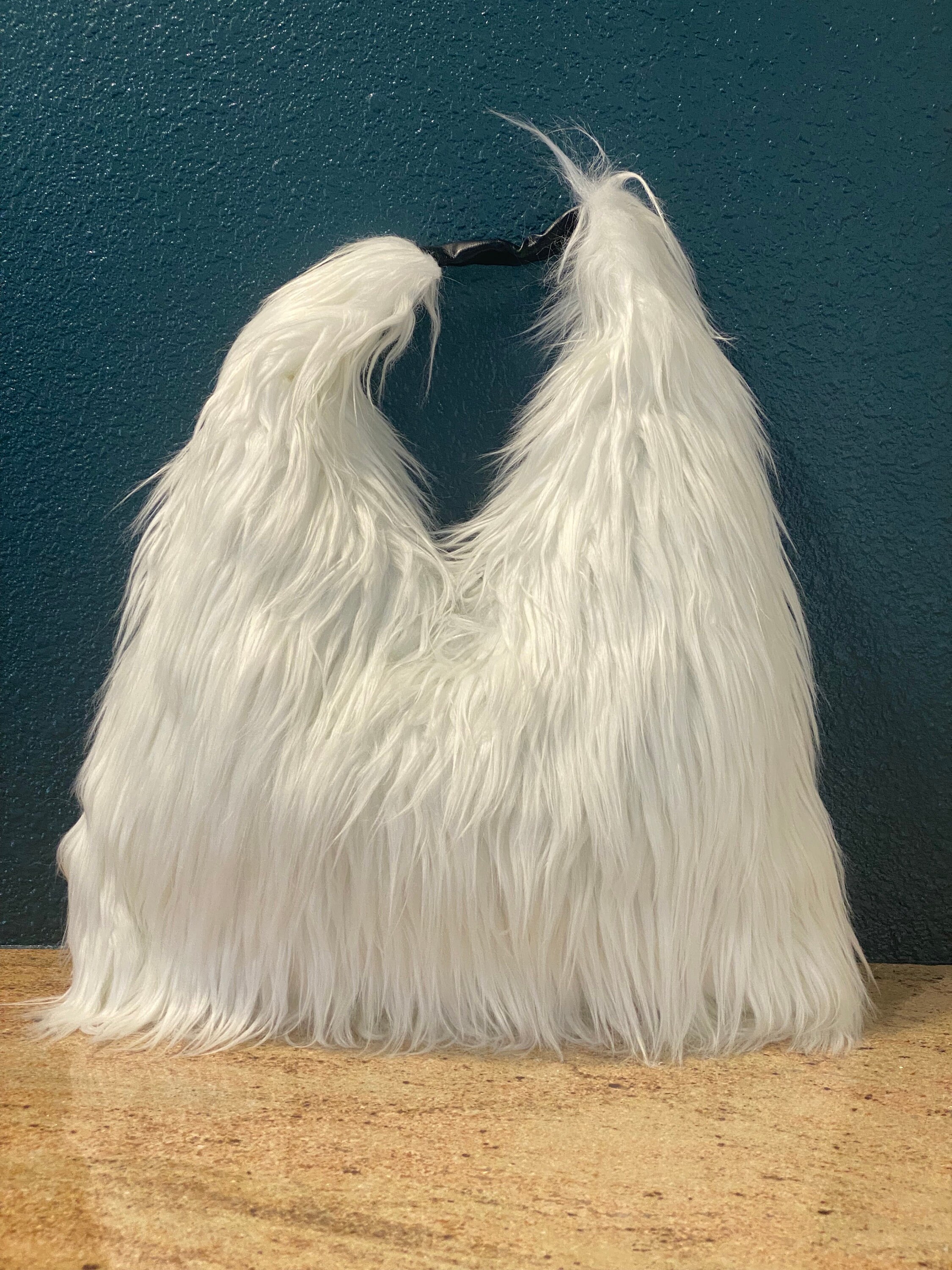 White faux deals fur purse