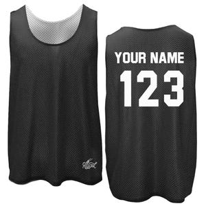 May include: Black basketball jersey with white mesh and white text on the back that says "YOUR NAME 123".