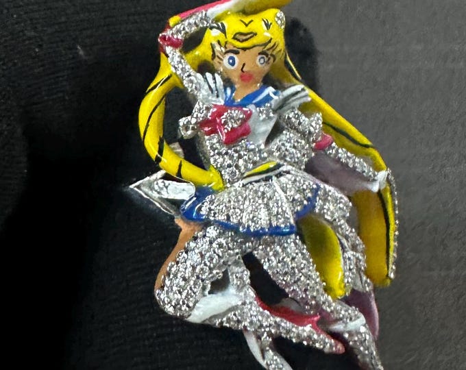 This stunning custom Goddess-style character pendant/ring is designed with extraordinary detail and a fully iced-out finish