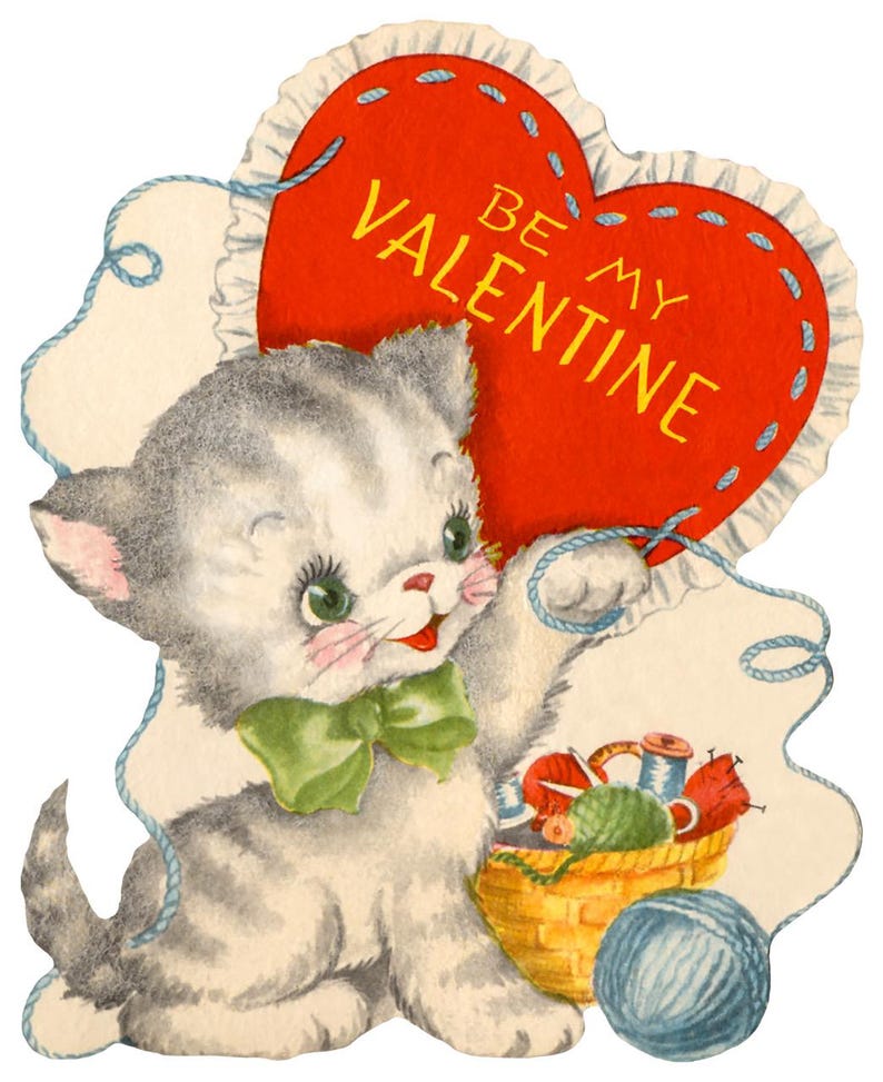 May include: Vintage Valentine's Day card featuring a gray and white kitten with a green bow tie. The kitten holds a blue string attached to a red heart with the text "BE MY VALENTINE". A basket of yarn and a blue ball of yarn are also present.