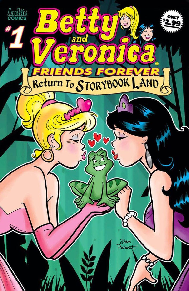 May include: Comic book cover featuring Betty and Veronica from Archie Comics. The title reads "Betty and Veronica: Friends Forever: Return to Storybook Land." The artwork depicts the characters kissing a frog, with hearts floating between them.