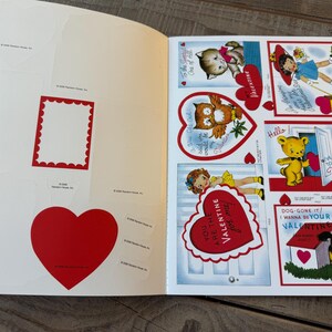 May include: A vintage Valentine's Day sticker book with various heart-shaped and rectangular stickers. The book features illustrations of animals, children, and phrases like "You are the Valentine for me!" and "I wanna be your Valentine!"