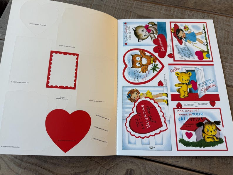 May include: A vintage Valentine's Day sticker book with various heart-shaped and rectangular stickers. The book features illustrations of animals, children, and phrases like "You are the Valentine for me!" and "I wanna be your Valentine!"