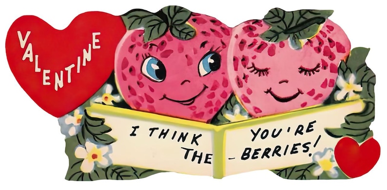 May include: A vintage Valentine's Day card featuring two anthropomorphic strawberries with smiling faces. A red heart with the word "VALENTINE" and the phrase "I THINK THE - YOU'RE BERRIES!" are also included.