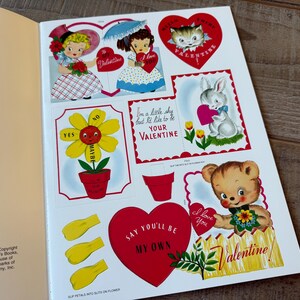 May include: A vintage Valentine's Day sticker sheet with illustrations of a flower, a kitten, a bunny, and a teddy bear. The designs are in red, white, and yellow, with Valentine's Day messages. The sheet is from a children's book.