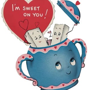 May include: A charming illustration featuring a blue teacup with a smiling face, containing two smiling sugar cubes. A red heart-shaped card with the text "I'm SWEET ON YOU!" is positioned above. Pink hearts adorn the teacup and card.