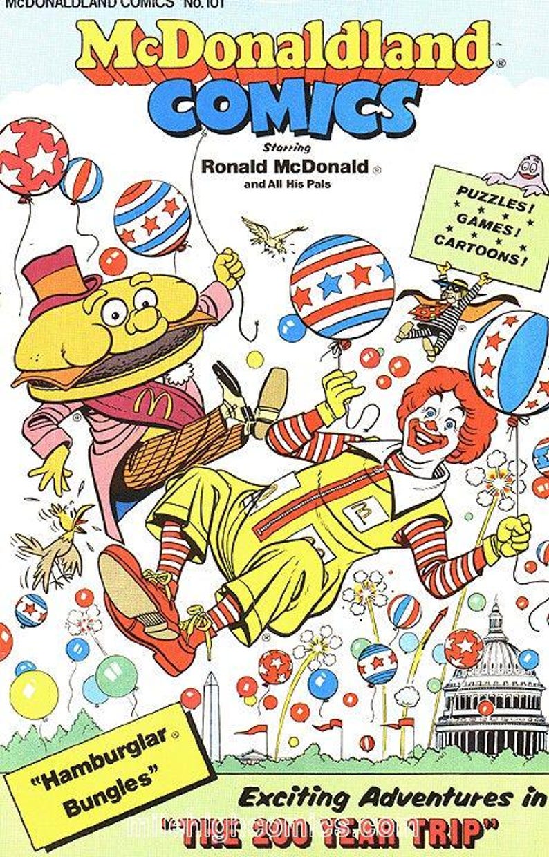 Puede incluir: Una portada de c&oacute;mic vintage de McDonaldland con Ronald McDonald y el Hamburglar. La portada del c&oacute;mic tiene globos coloridos, personajes de dibujos animados y el texto "Exciting Adventures in the 200 Year Trip."
