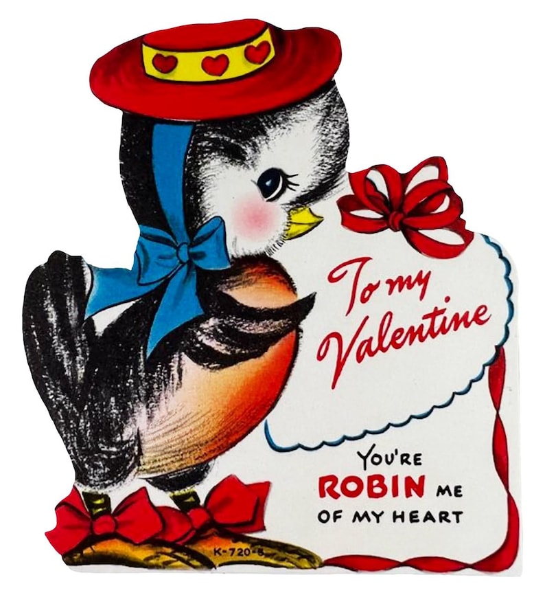 May include: Vintage Valentine's Day card featuring a cartoon bird with a red hat and bow. The bird has black and white feathers, a red breast, and a blue bow. The card reads "To my Valentine, You're ROBIN me of my heart."