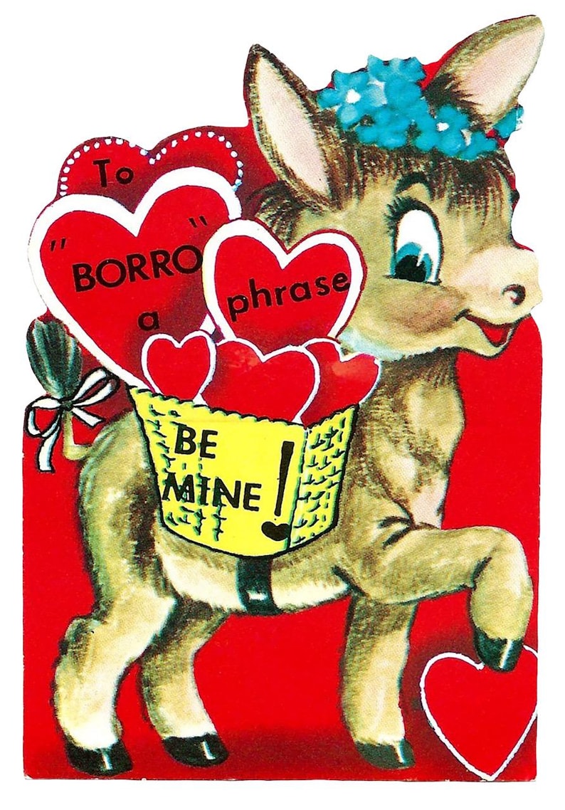 May include: Vintage Valentine's Day card featuring a cartoon donkey with a blue flower crown. The donkey carries a basket with hearts and the words "BE MINE." Red hearts and text bubbles with phrases like "To borrow a phrase" complete the design.