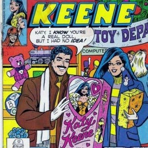 Pu&ograve; includere: Copertina di fumetto a tema natalizio con "Katy Keene". Un uomo e una donna tengono in mano una scatola di bambole "Katy Keene". Il testo recita "Katy as a real doll? See inside!" e "High Fashion Doll".