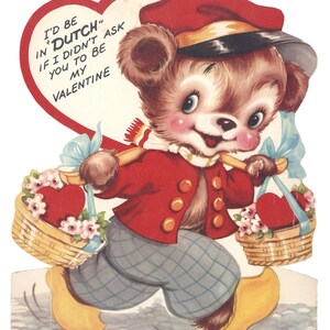 May include: Vintage Valentine's Day card featuring a cartoon bear dressed in Dutch attire. The bear, wearing a red jacket and hat, carries baskets of flowers and hearts. The card includes the text "I'd be in 'Dutch' if I didn't ask you to be my Valentine."