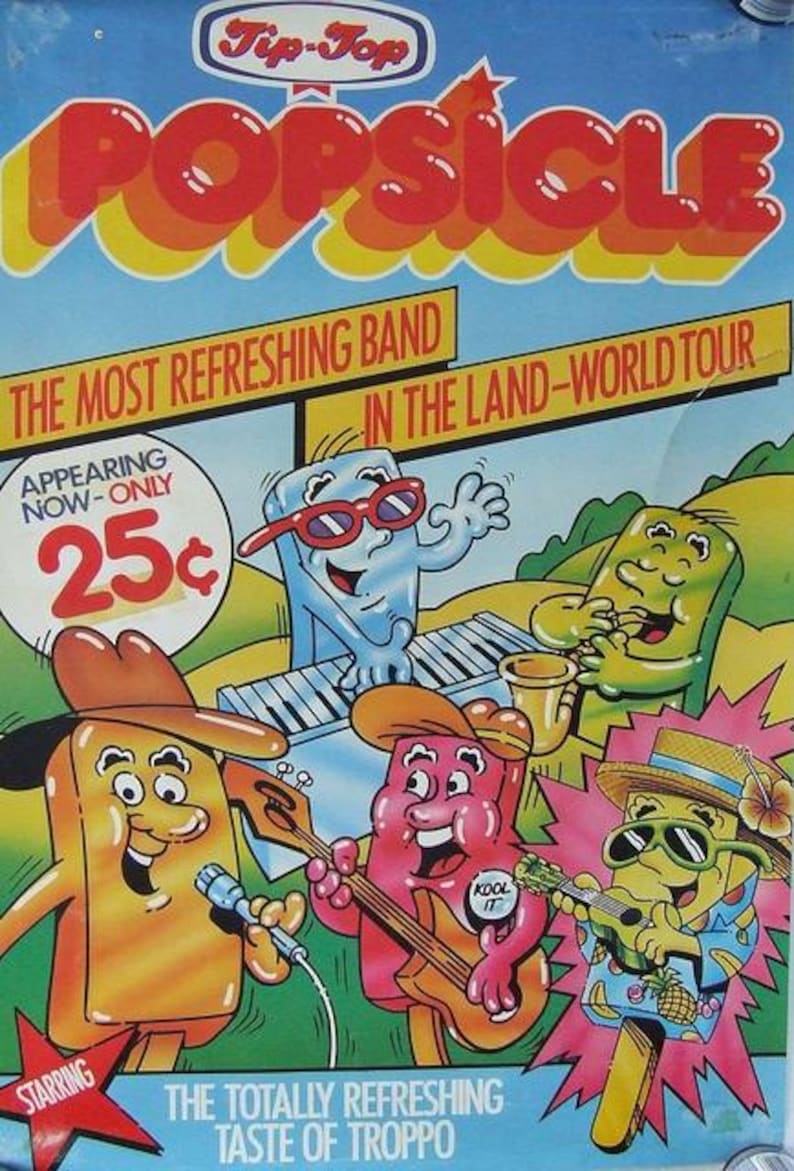 May include: Vintage Popsicle advertisement poster. The poster features cartoon popsicle characters playing musical instruments. Text includes "The Most Refreshing Band in the Land-World Tour" and "The Totally Refreshing Taste of Troppo."