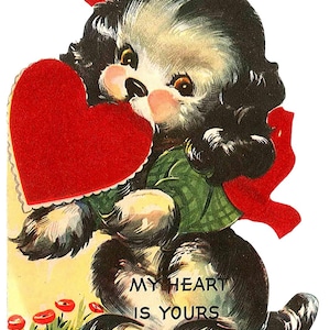 May include: Vintage Valentine's Day card featuring a black and white puppy holding a red heart. The puppy wears a green jacket and a red bow. The text "MY HEART IS YOURS" is displayed below the puppy.