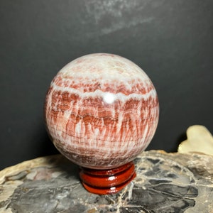 Pork stone sphere, banded calcite sphere