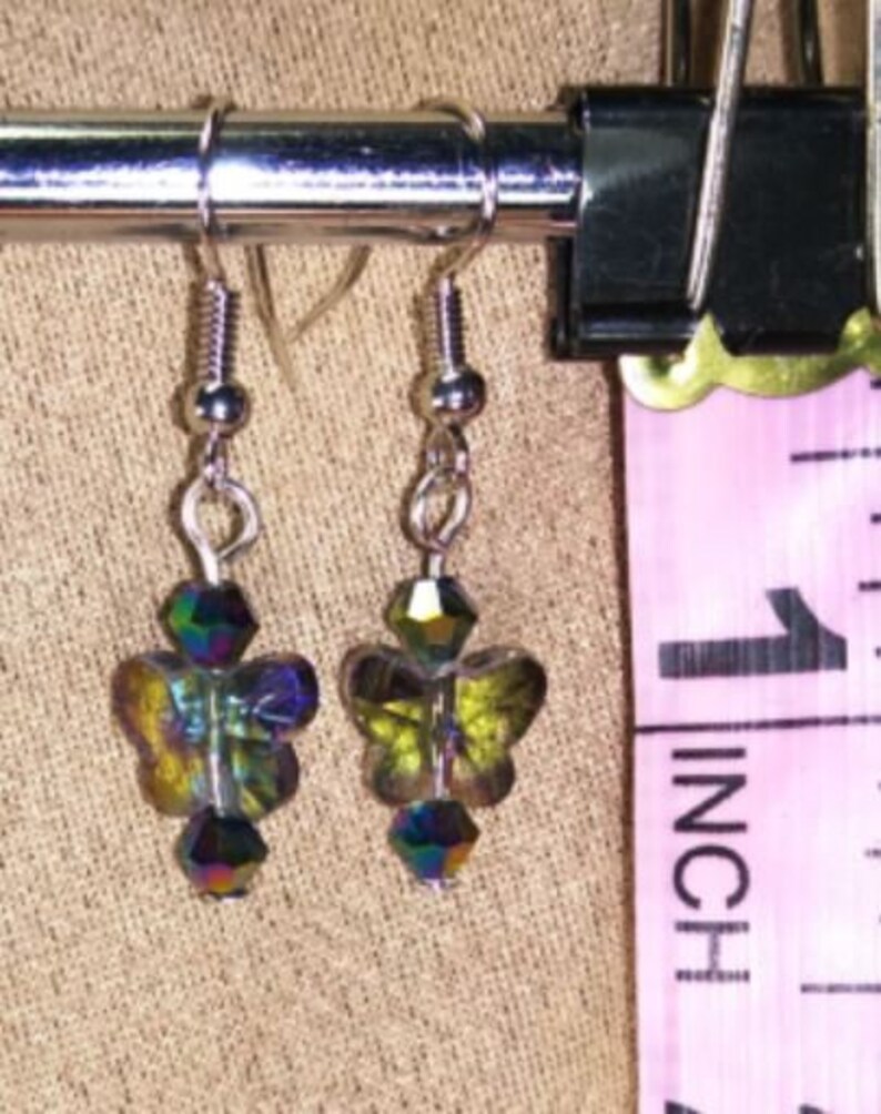made with nickel freehypoallergenic hooks. crystal butterflies Lightweight Earrings