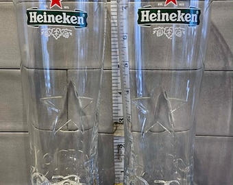 Un par de vasos de media pinta Heineken muy únicos