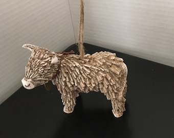 Hamish the Hanging Highland Cow
