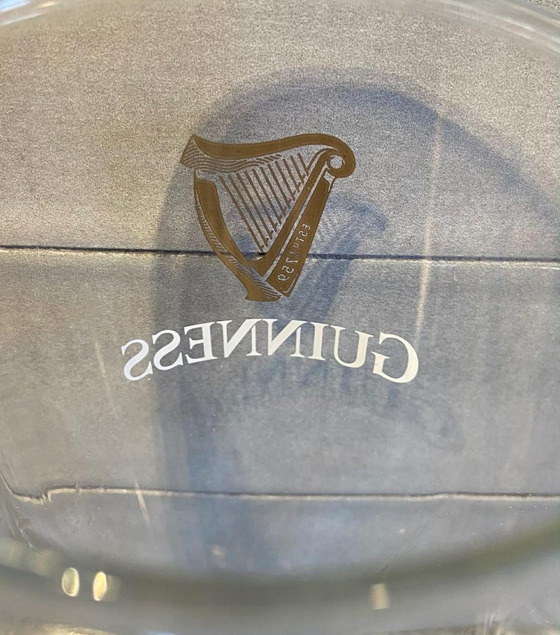 May include: A set of three ceramic mugs with a speckled, matte finish. The mugs are in shades of cream, light gray, and dark gray. Each mug has a simple, minimalist design, perfect for coffee or tea.