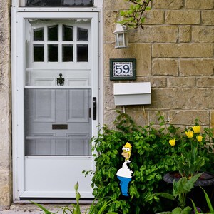 Garden Landscape Accent Homer Simpson Metal Yard Stake Cartoon Character Outdoor Display Weatherproof Lawn Ornament Sign Fan Collectible Gift Birthday Present UV Printed Fade Resistant Patio Addition Made In USA Durable Metal Construction