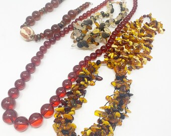 590 Collection of vintage glass, plastic and lucite bead necklaces