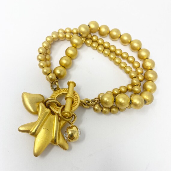 595 vintage Fred Hayman gold colored star beaded B