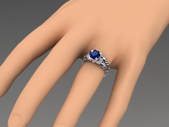 White gold blue shop stone engagement ring