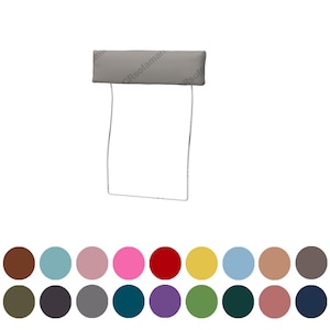 May include: A light gray headrest with a rectangular shape, attached to a thin, silver-colored metal frame. Below the headrest are a series of colorful circular swatches, offering a variety of color options.