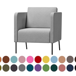 Peut inclure: Un fauteuil gris avec des pieds noirs. Le fauteuil a un design simple et moderne et est rembourré d'un tissu doux et texturé.