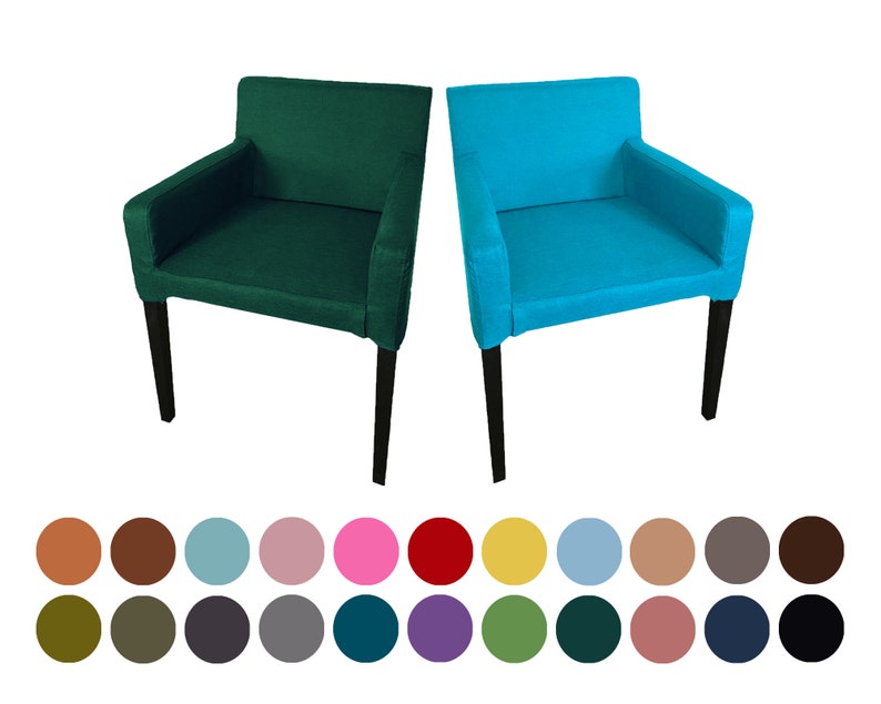 May include: Two chairs, one green and one blue, with black legs. The chairs are upholstered in a fabric material.