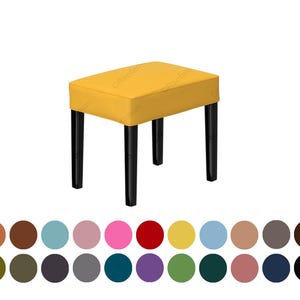 May include: A rectangular stool with a mustard yellow upholstered seat and four straight black legs. Below the stool, there is a grid of twenty-four circular color swatches displaying various fabric options in shades of red, blue, green, and neutral tones.