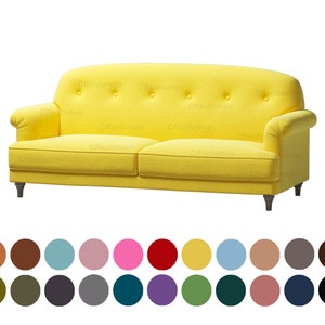 May include: A yellow button-tufted sofa with rolled arms and wooden legs. The sofa is upholstered in a soft, textured fabric.