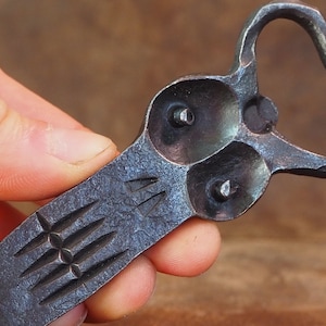 Hand forged bottle openers. Medium. Fun bottle openers. Forged. Metal. Faces
