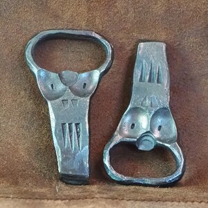 Hand forged bottle openers. Small. Fun bottle openers. Forged. Metal. Faces