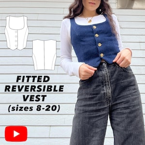 May include: A dark blue fitted, reversible vest with gold buttons, worn over a white long-sleeved top and black jeans. The image includes a diagram of the vest and text that reads "FITTED REVERSIBLE VEST (sizes 8-20)".