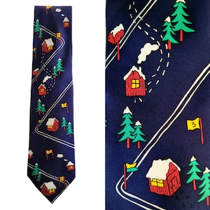 May include: A blue silk tie with a winter sports theme. The tie features a repeating pattern of red and white cabins, green pine trees, and white snow. The tie also has a white and yellow flag with the number 3 on it.