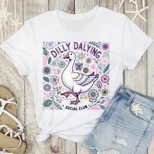 a t - shirt with a picture of a duck on it