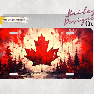 Puede incluir: Una bandera canadiense roja y blanca con una gran hoja de arce roja en el centro. La bandera está pintada en estilo acuarela con una escena de bosque en el fondo. El texto "Bailey Designed Co." es visible en la esquina superior derecha.